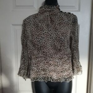 W.D.N.Y.long sleeve blouse cheetah print size medium A- 49 5/$25